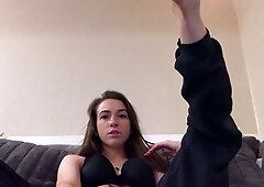 Brunette with foot fetish rubs big dick with her feet in POV