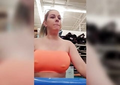 Breasty blond tube top flash