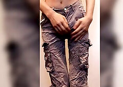 Topless trans hotty sluggishly pees in her taut cargos
