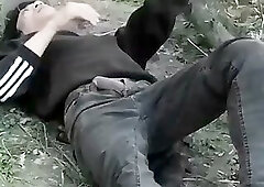 Cute Jon Arteen Gay twink jerks off outdoors, dry-humps the air, and shoots cum through a hole in