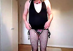 Little black dress and fishnet pantyhose