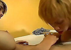 Thai Ladyboy Sucks Cock From a Shemale with a Dildo in Her Ass