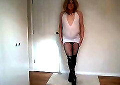 Blonde in tight white dress, fishnets and boots