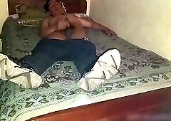 I masturbate in the bed of a hotel room
