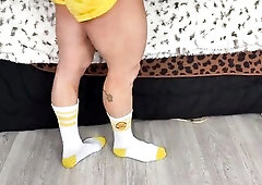 I just finished an intensive game of dodgeball, and my lengthy white tube socks are perspired and mellow. Below these tube socks is some other layer o